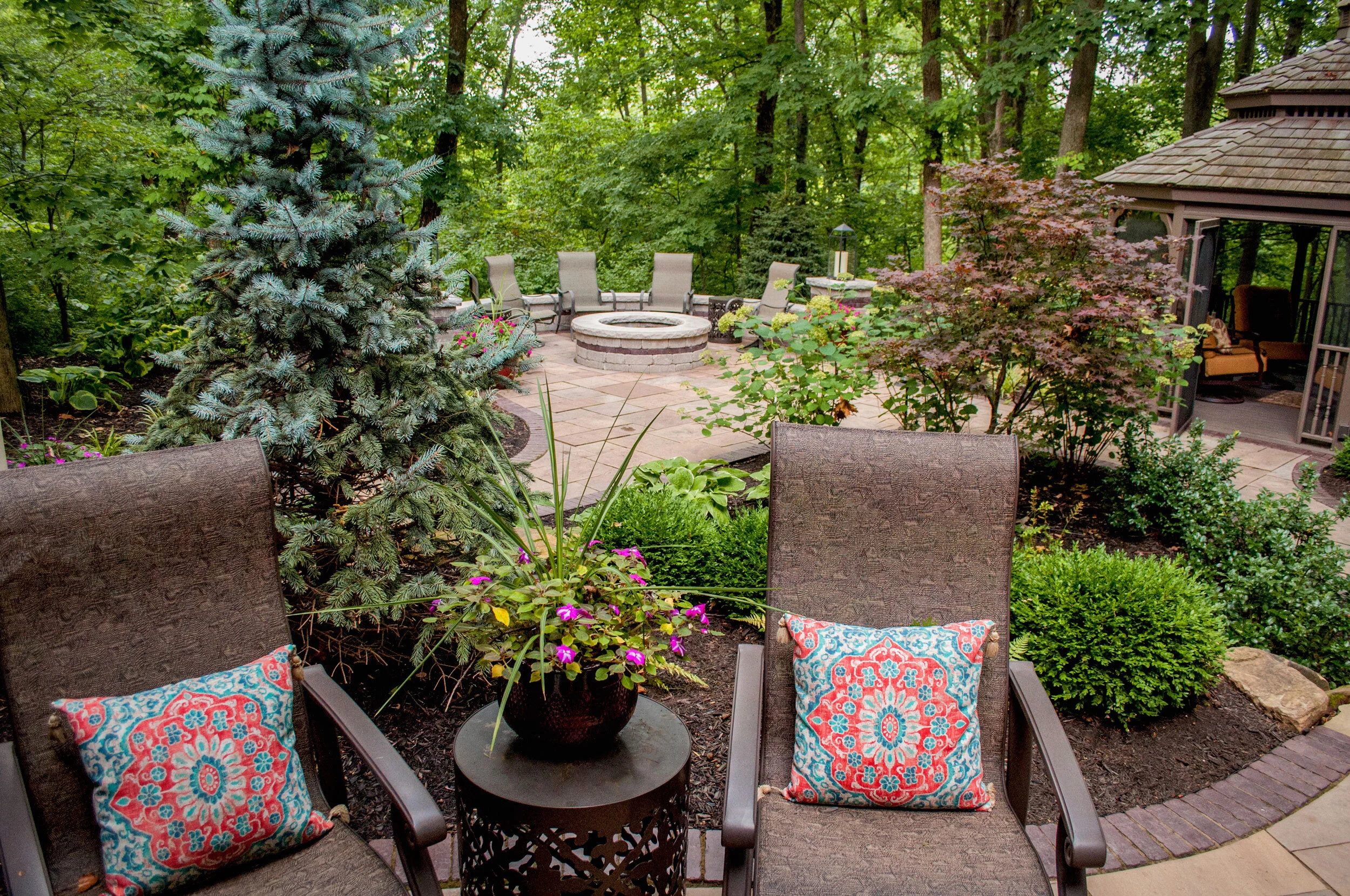 Shade tolerant garden beds featuring boxwood and a Japanese Maple created by Sundown Gardens.jpg