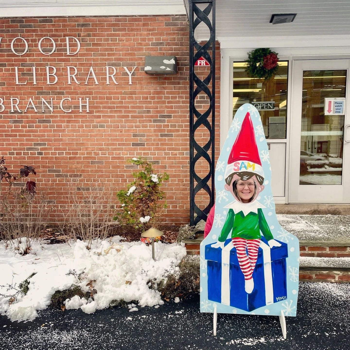 Have you met the new @springfield_ave holiday sidekick Sam the Elf? This month Sam the Elf is popping up all along Springfield Ave&hellip;.catch him in front of Hilton Branch Library before Wednesday! Strike a pose and tag your pic with #SamTheElf to