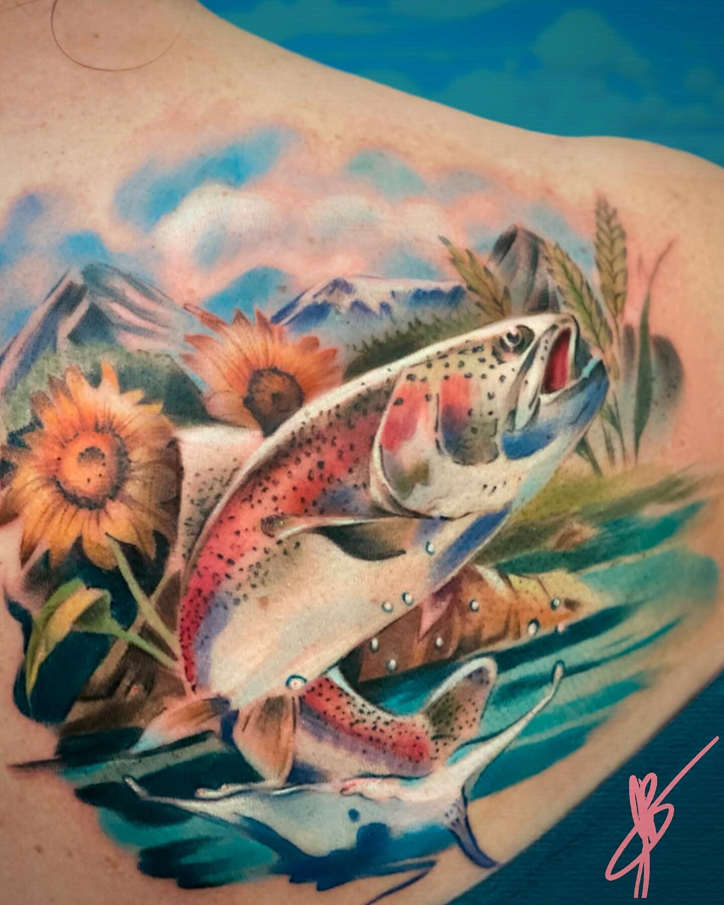 Rainbow trout, sun flowers, and winter wheat: memories of a trip to Montana. People get tattoos to commemorate trips and events. Others get them to remember loved ones. Some use tattoos as a way to express themselves. Often clients tell me that they 
