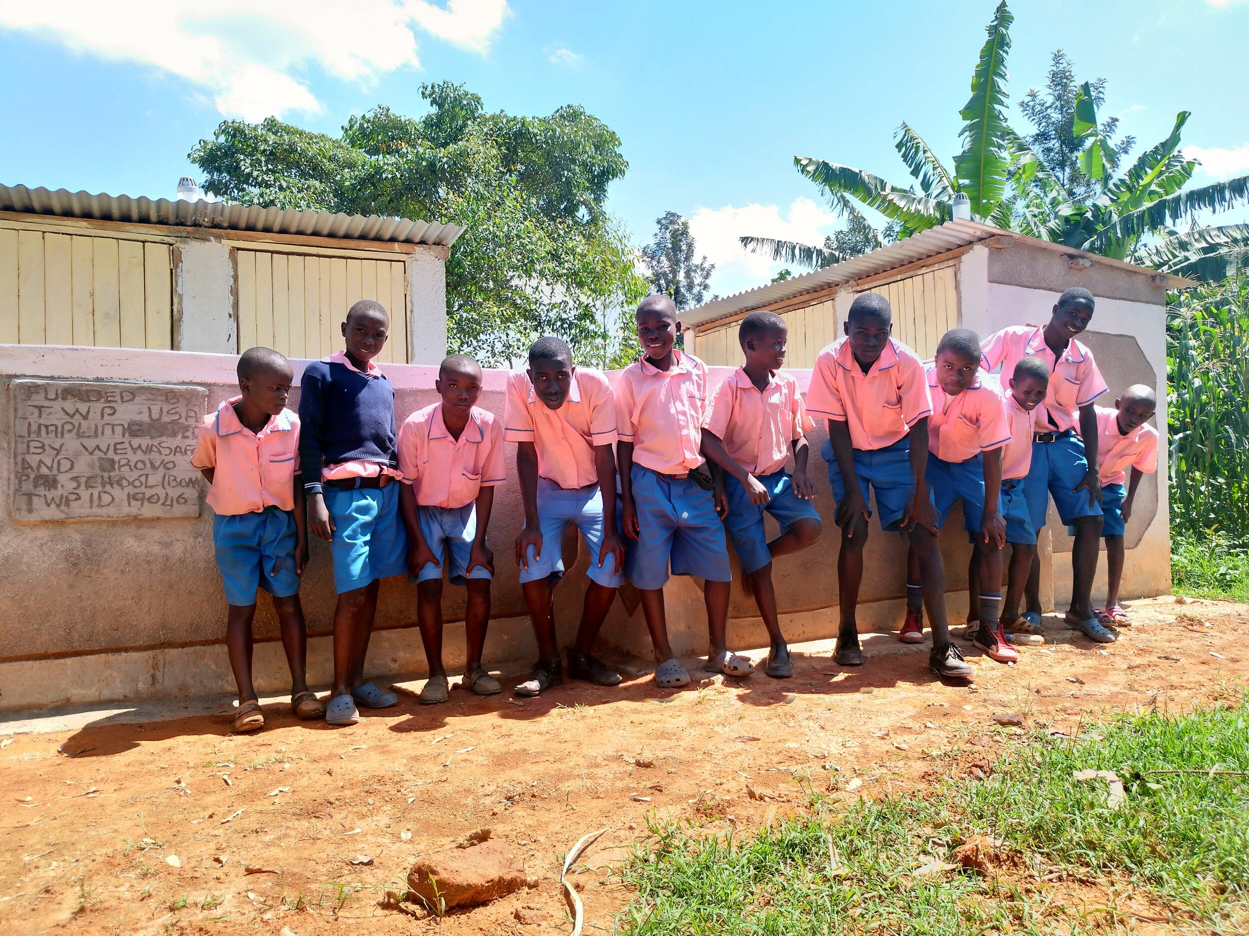 33 kenya19046 Boys in front of latrines.jpg