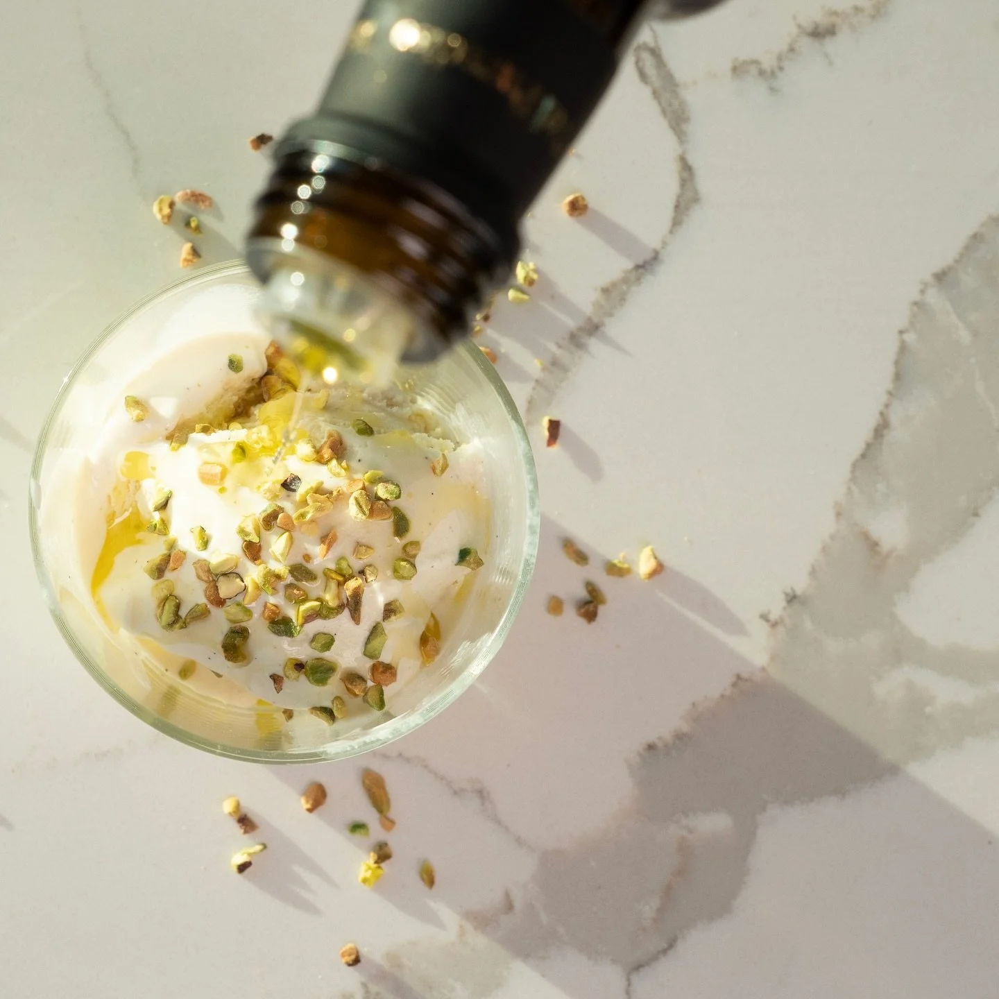 @val_paradiso Extra Virgin Olive Oil al Limone 🍋 drizzled over vanilla ice cream 🍨 + pistachio granules + touched of sea salt = perfection. 

#ASicilianExperience #IceCream #ExtraVirginOliveOil #Desserts #Sicily #Lemon #🍋 #🍦