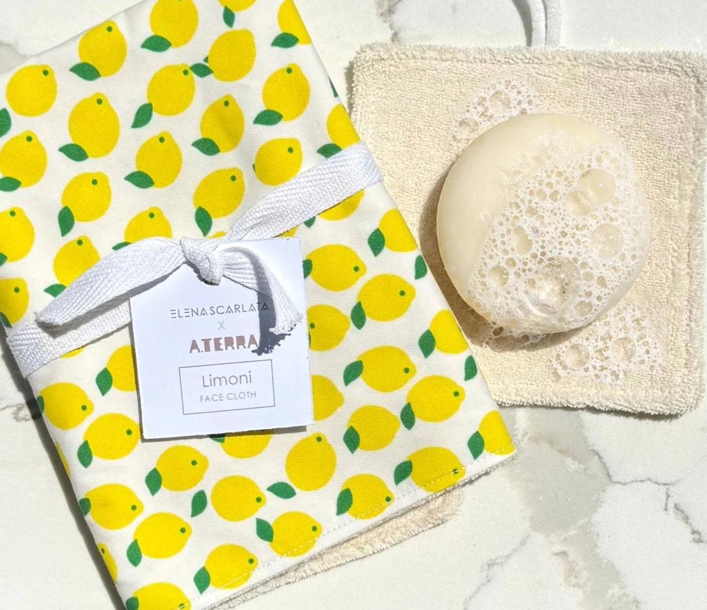 More from our collaboration with @elena_scarlata_studio 🍋 light and bright prints ideal for pampering for the important women in our lives this Mother&rsquo;s Day. 

Facecloth and scrub set is paired with an organic delicate face bar made with cornf