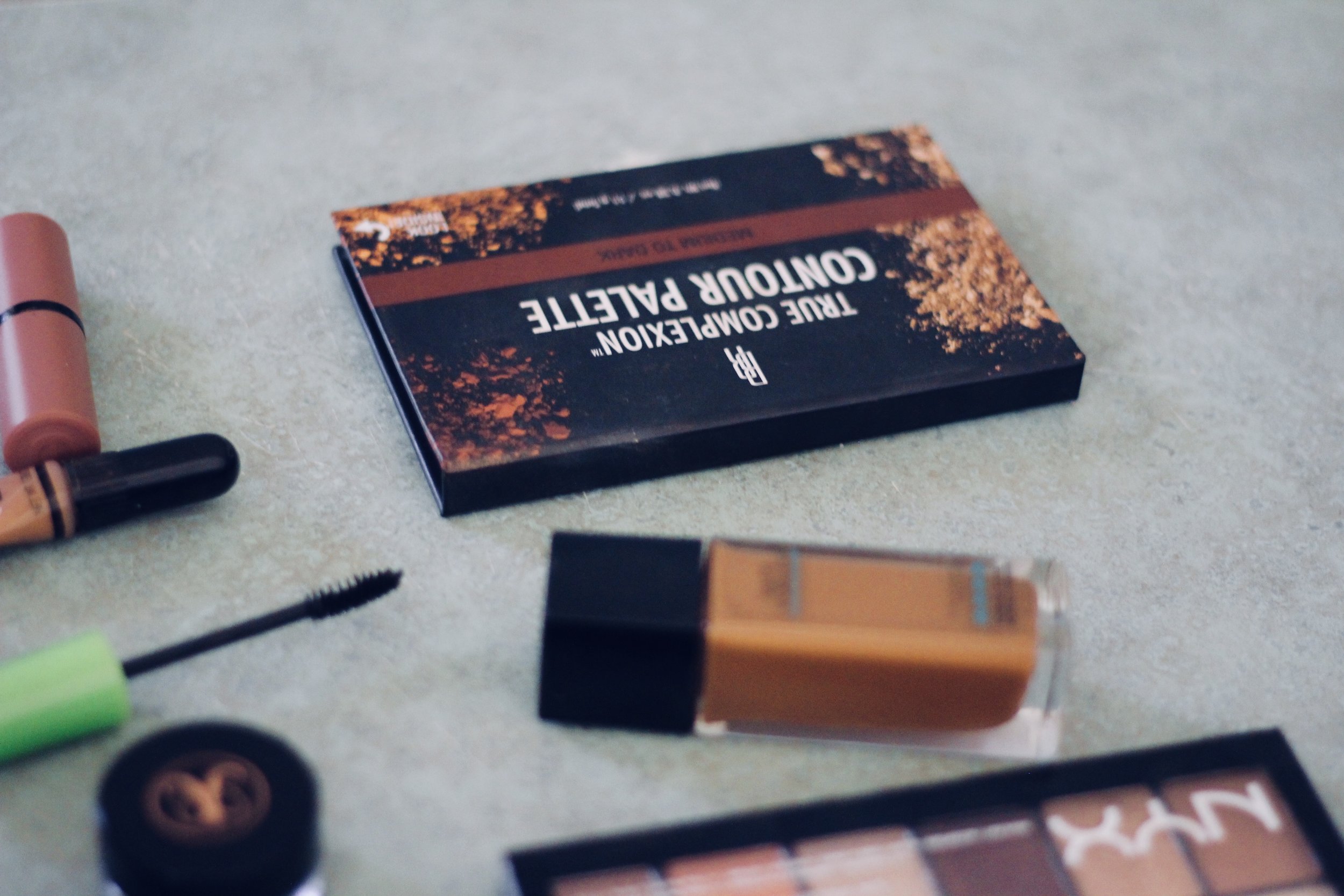 Daily Makeup Essentials | Let's be real, makeup is an art. It can take a long time to master your skill. However, with my current schedule I don't have that kind of time. I decided to share my tried and true essential products for a quick face and slight beat. Read more on the blog.