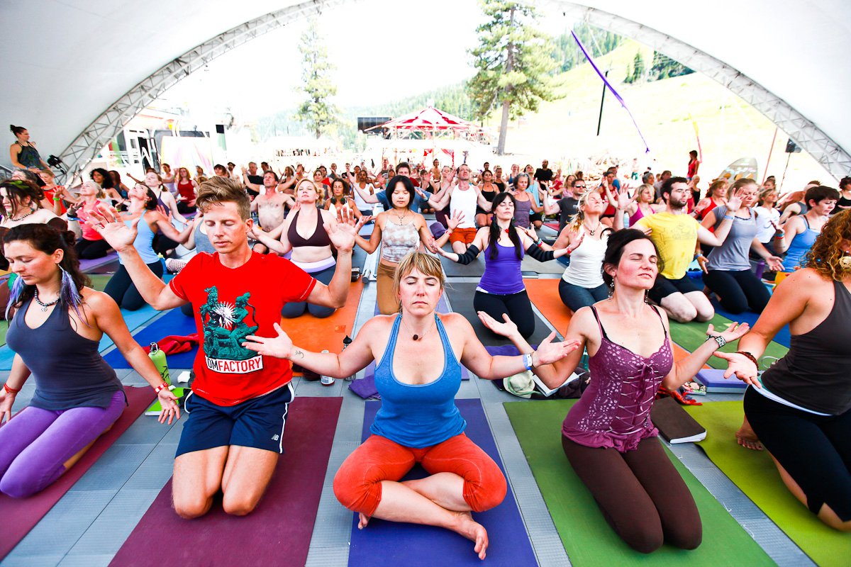 Sam leads large yoga class.jpg