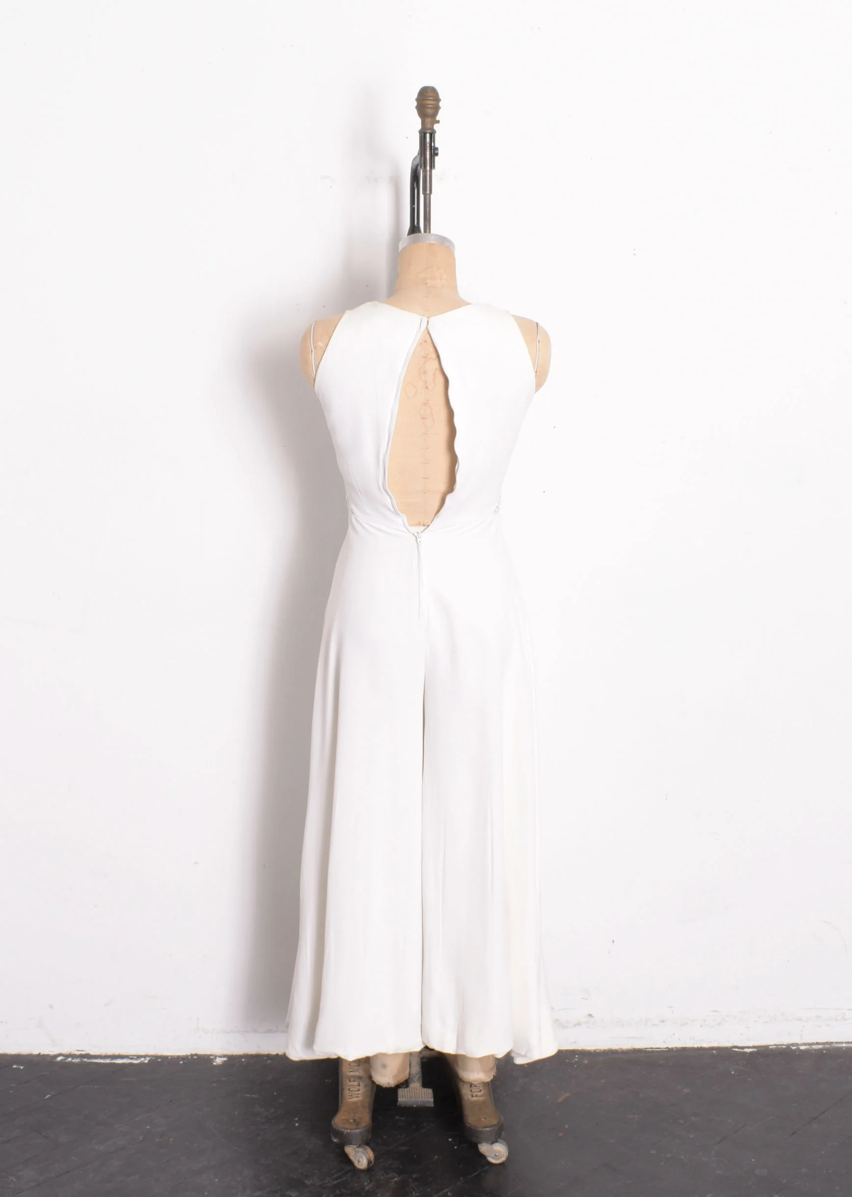 1960s white jumpsuit.jpg