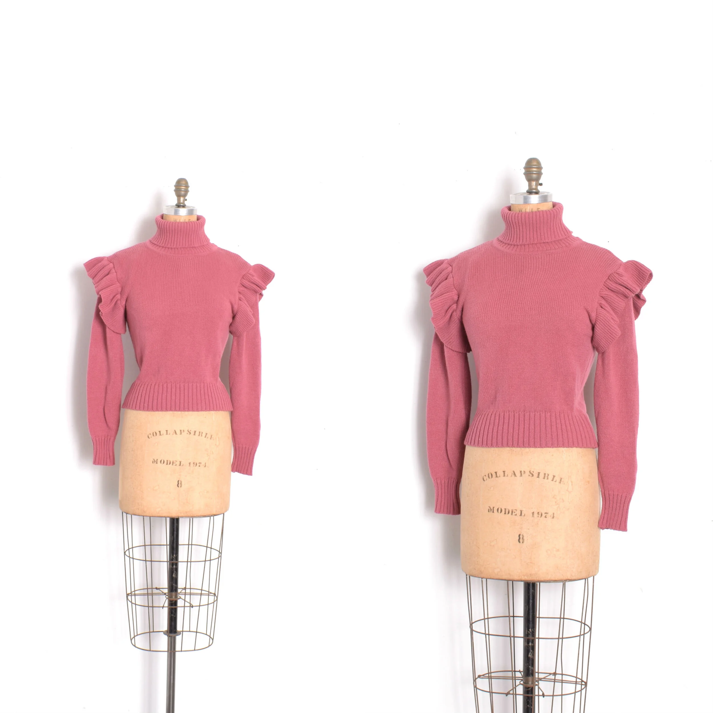 1980s pink knit turtleneck sweater with ruffled shoulders