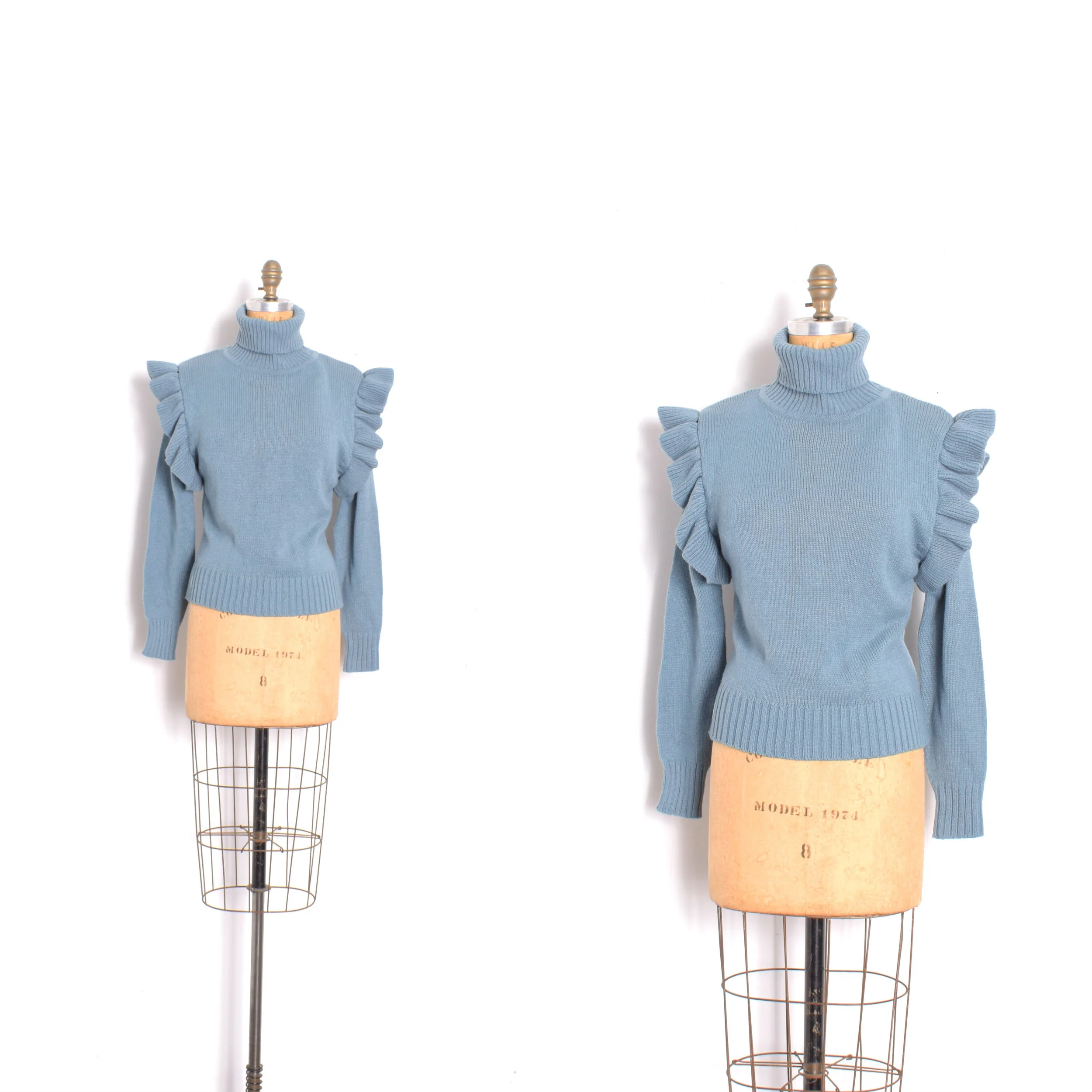 1980s blue knit turtleneck sweater with ruffled shoulders