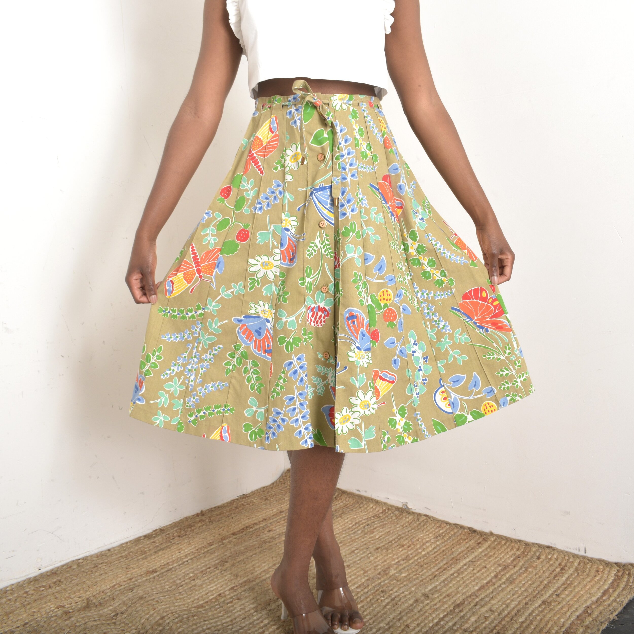 1970s tan cotton skirt with garden print butterfly strawberry floral plants