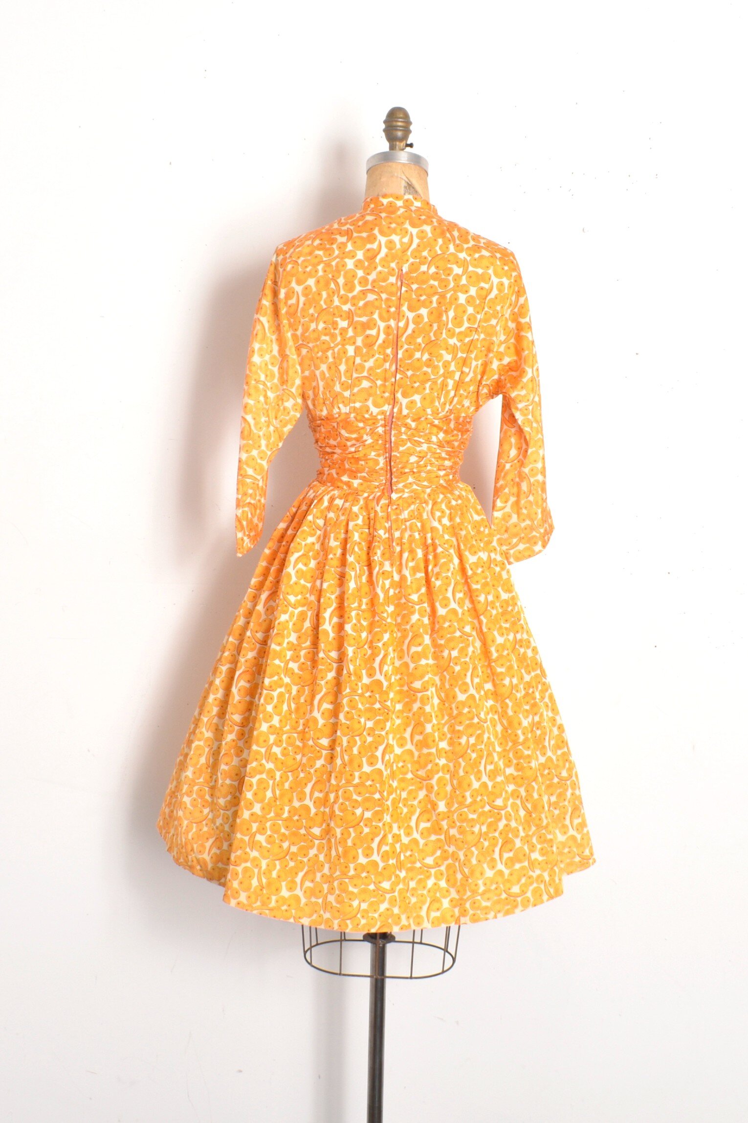 1950s orange print dress.jpeg