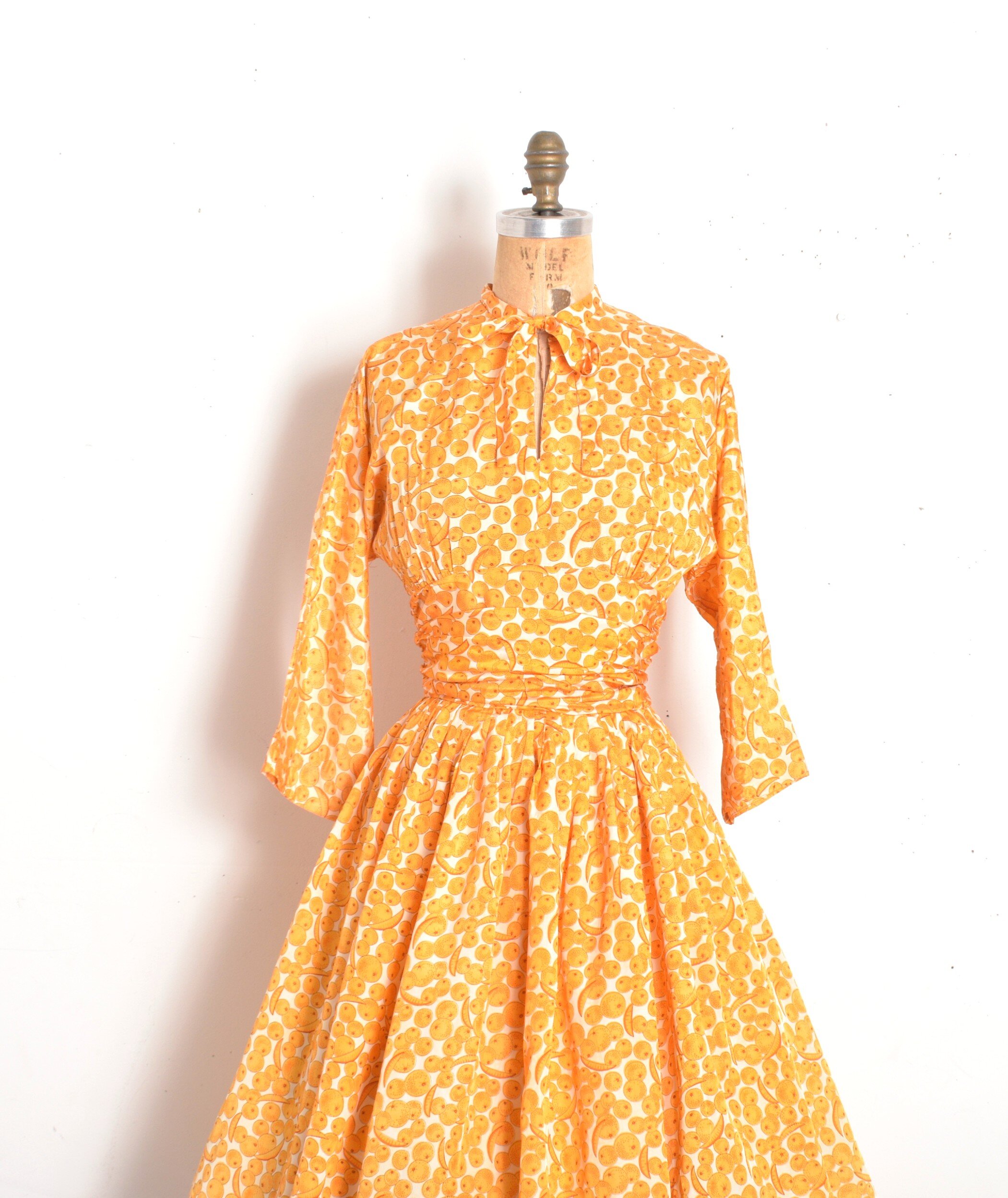 1950s orange print dress3.jpeg