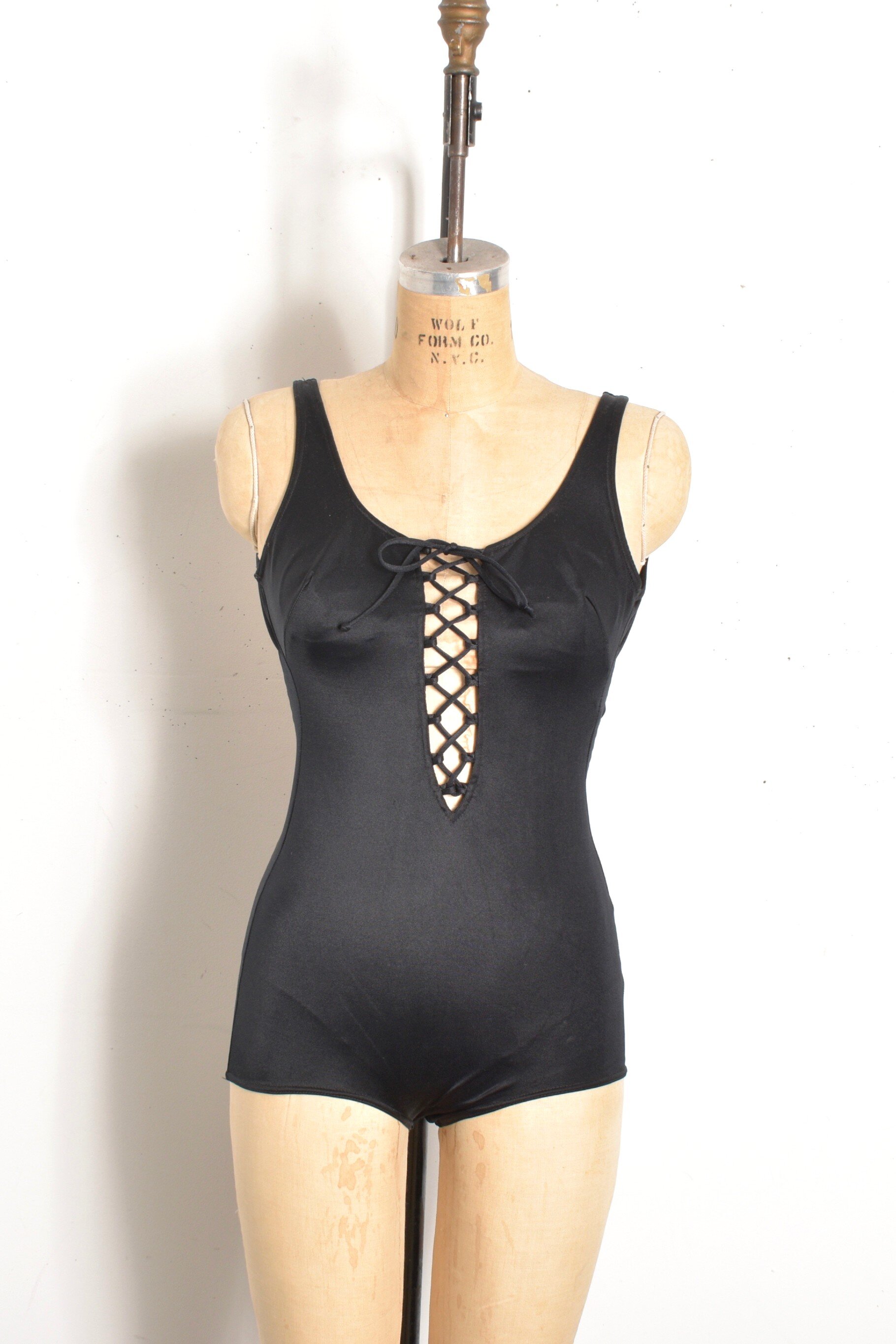 1960s gottex black lace up one piece swimsuit bathing suit