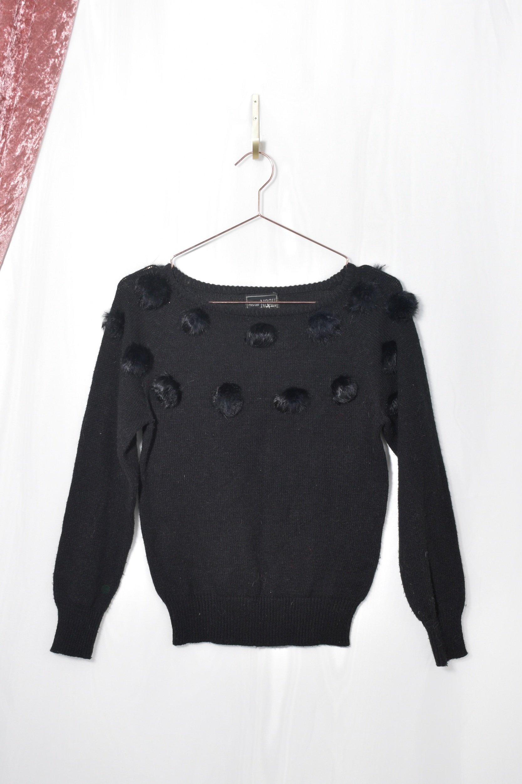 1980s black knit pullover sweater with real fur pom pom trim details
