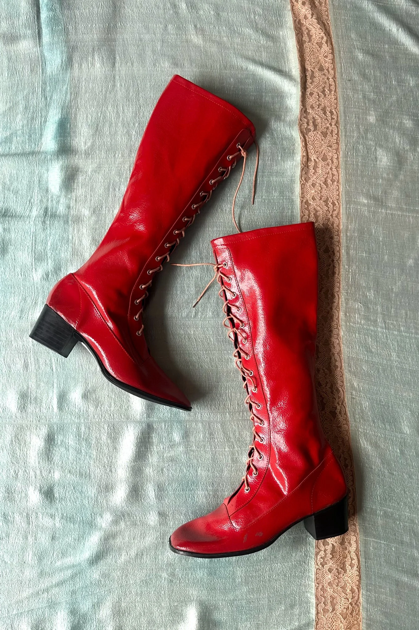 1960s 1970s red vinyl lace up gogo boots