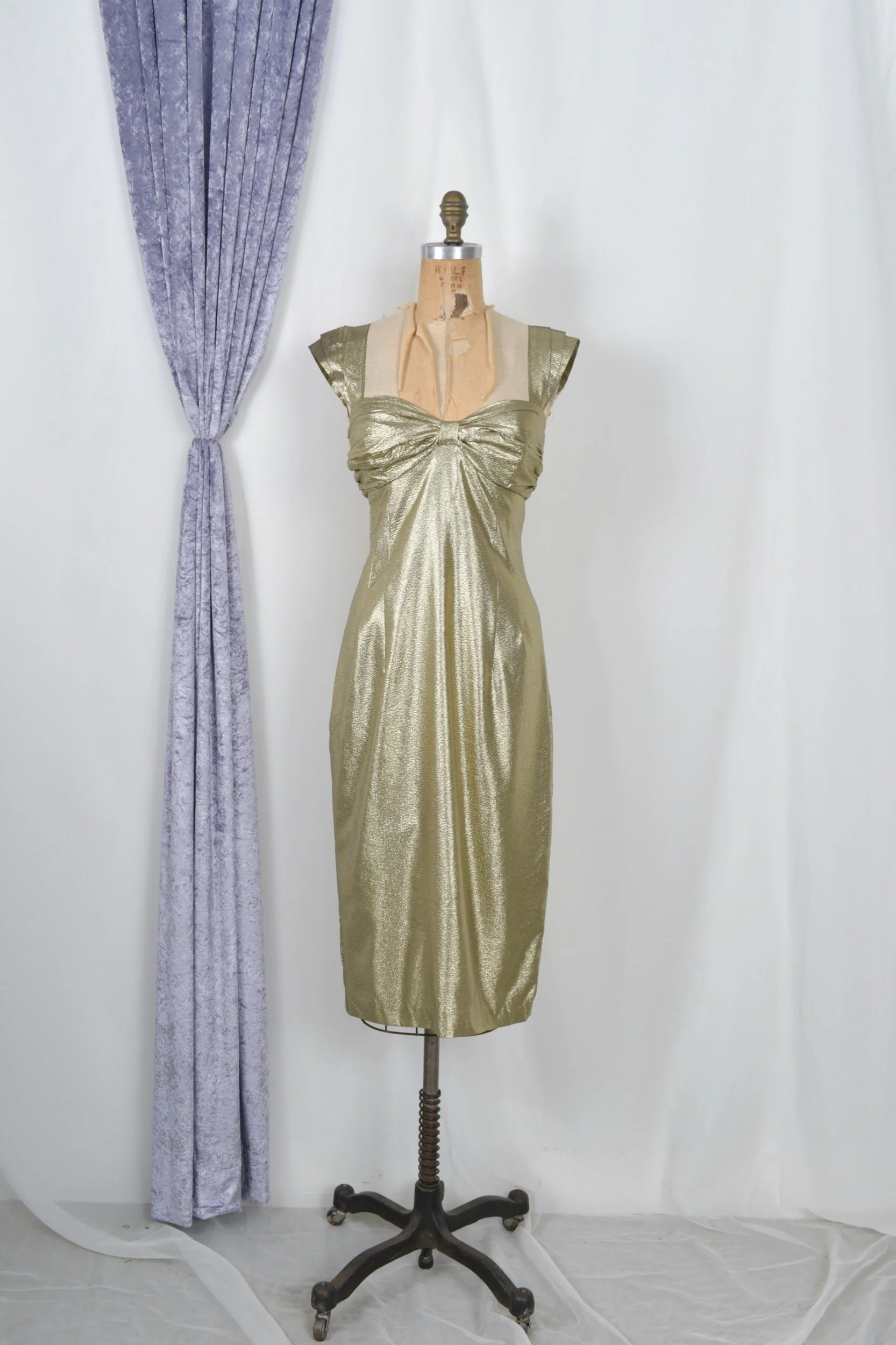 1980s metallic gold lame party dress by Barbara Barbara