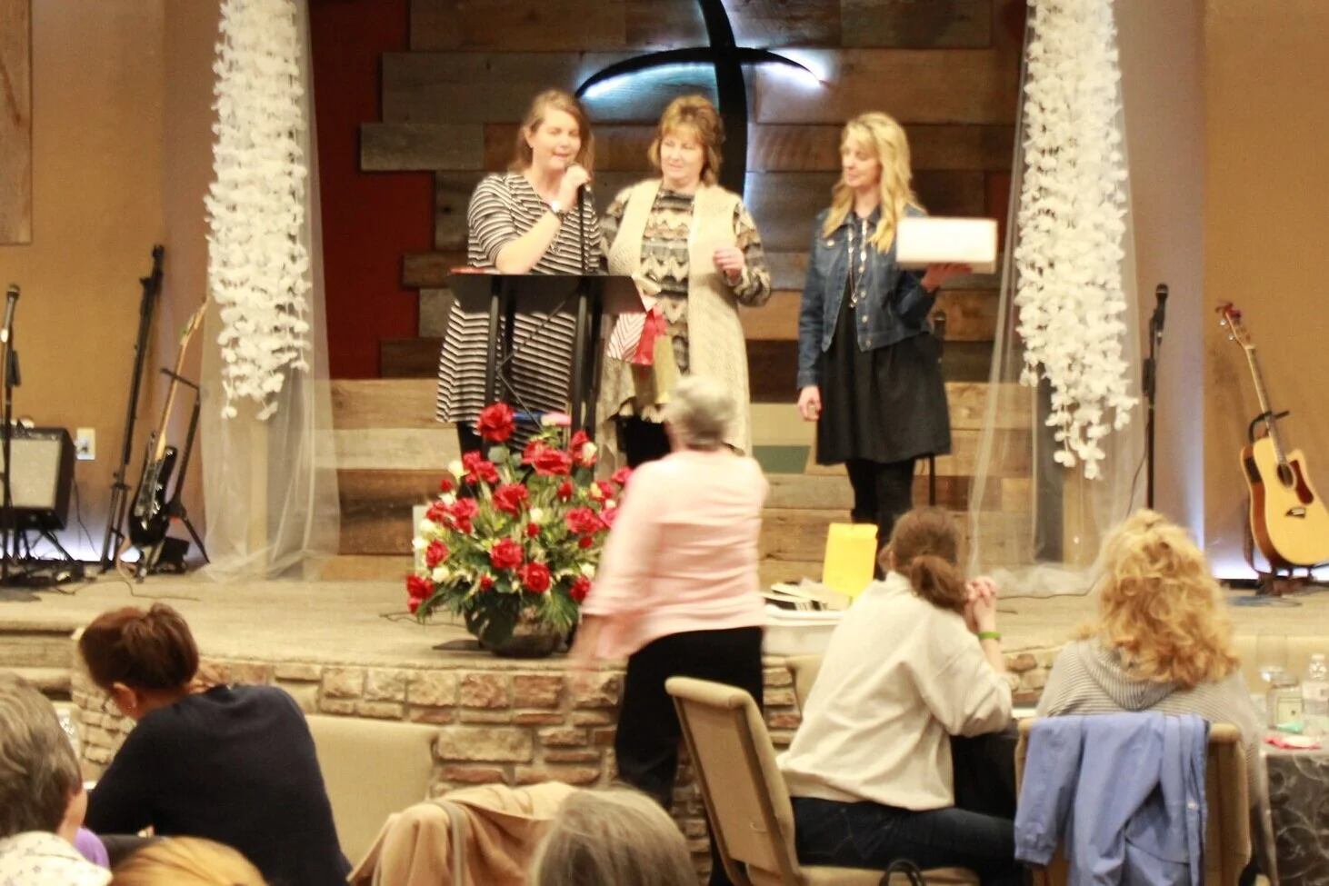The Girls presenting one of the many door prizes given at the event