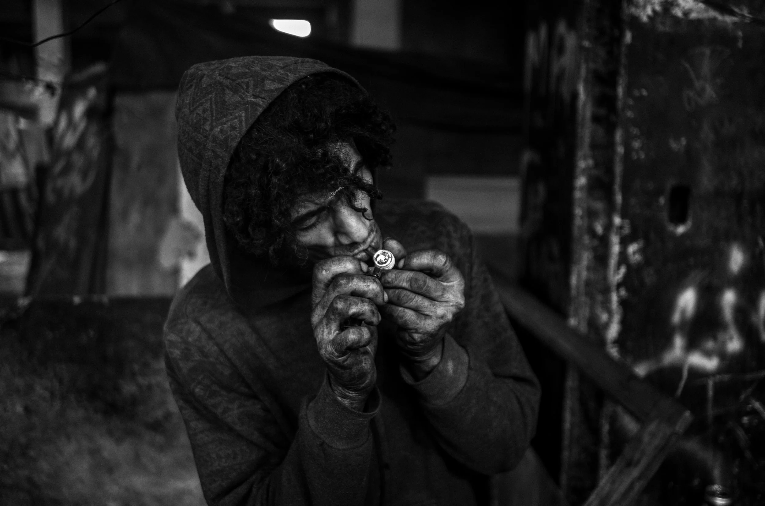  Man smokes crack in a CV controlled trap house. 