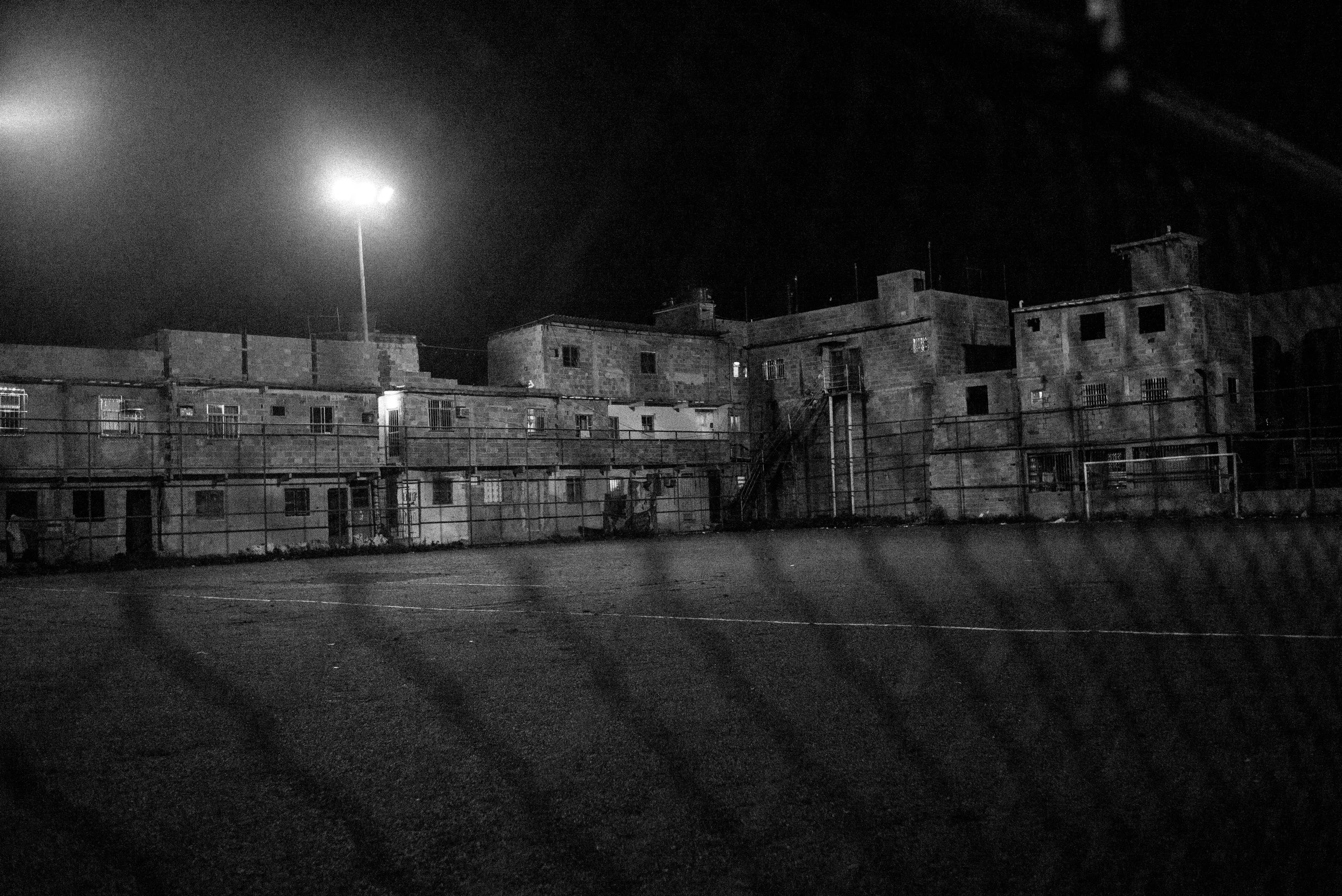  Soccer field at night in favela Parque União. 