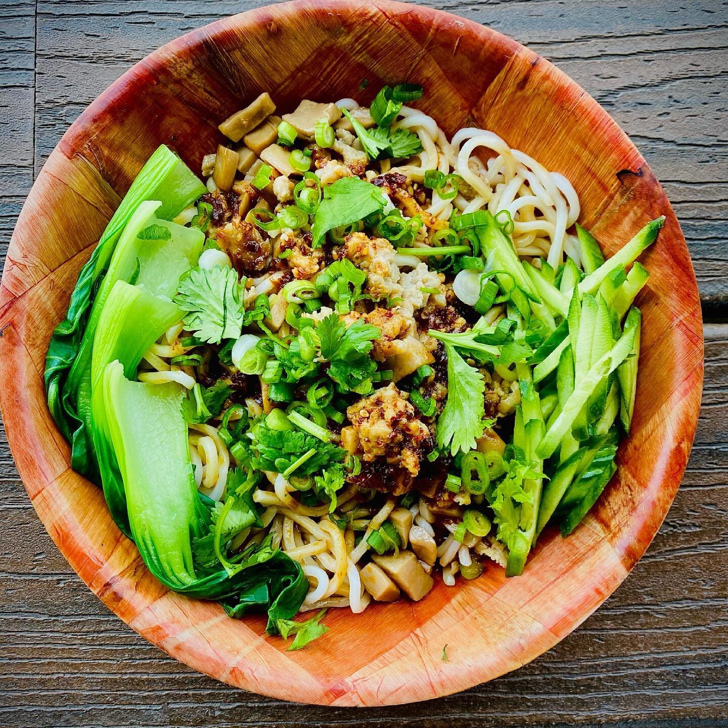 Survive Houston summers with our Spicy Szechuan Noodles. Those cool strips of cucumber in every bite help cool off the tingly spice from our Szechuan chili oil. Get it with noodles of your choice and can be vegan and gluten free! Order online on our 