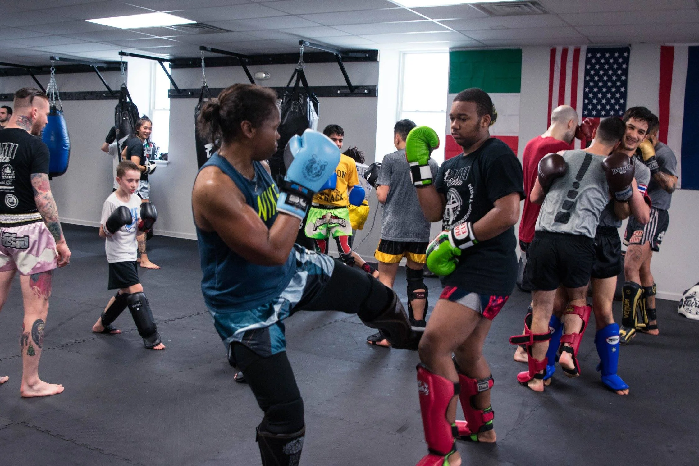 Drilling Muay Thai technique.