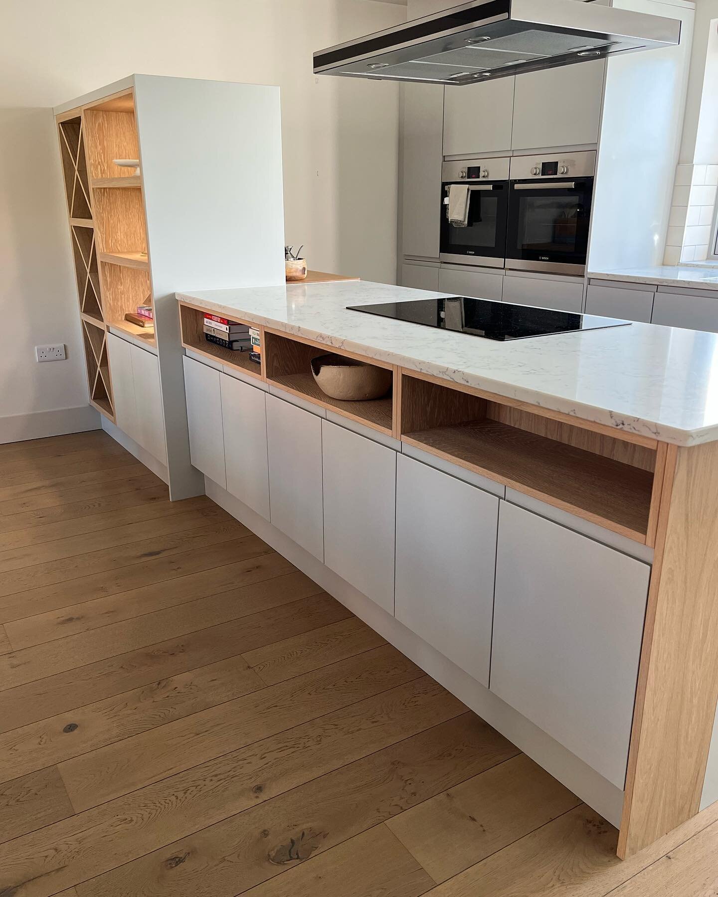 An interesting kitchen project to turn an existing kitchen island into a peninsula with an oak wine rack and some feature cabinets.

#handmadefurniture #paintedfurniture  #kitchenssuffolk