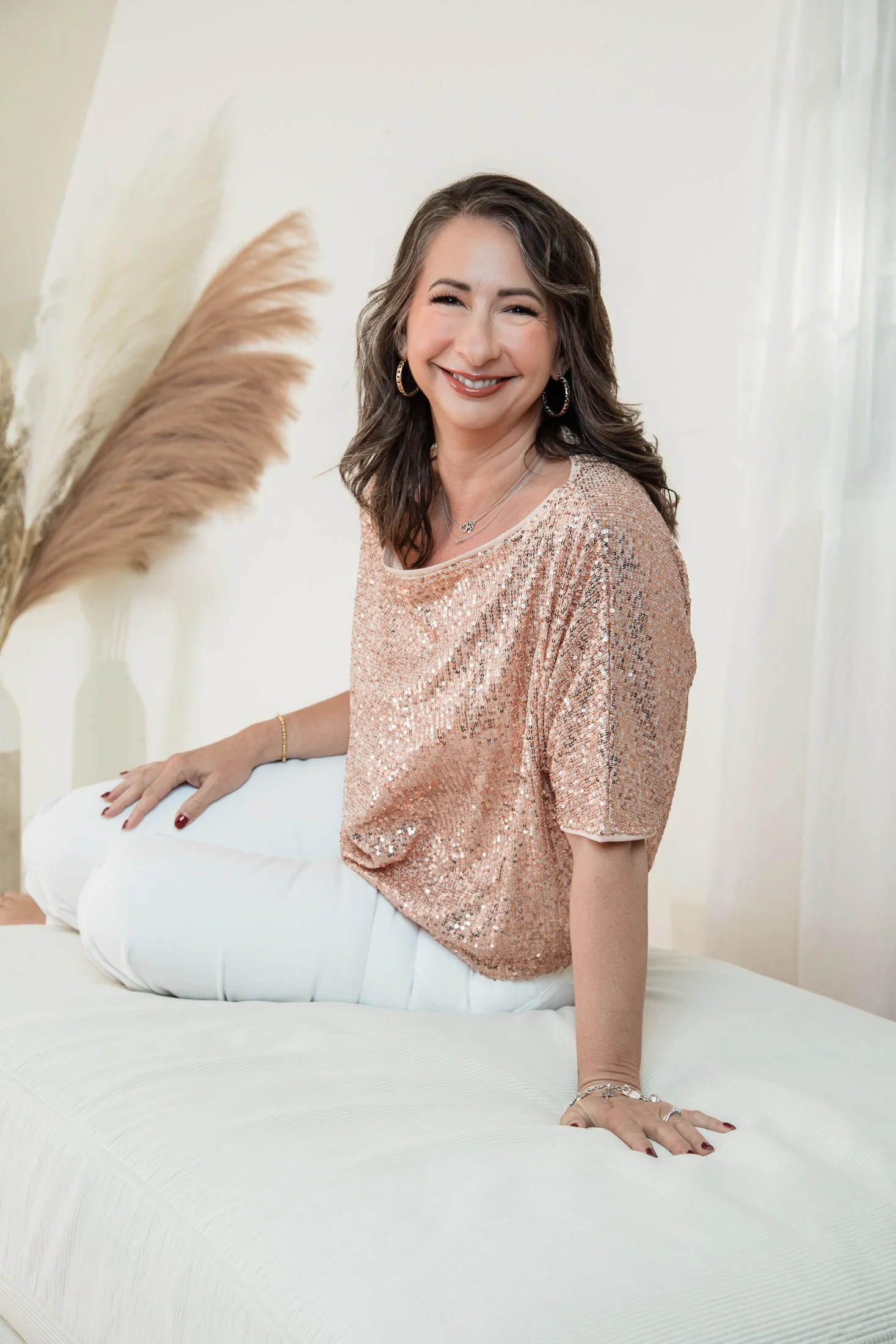 Timeless studio portrait of Michele, celebrating beauty and confidence after 50.