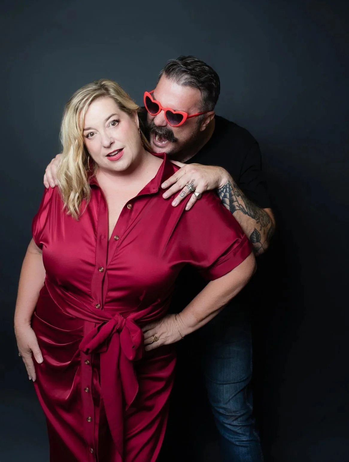 Kim and Cody in a quirky couple's shot highlighting their fun personalities