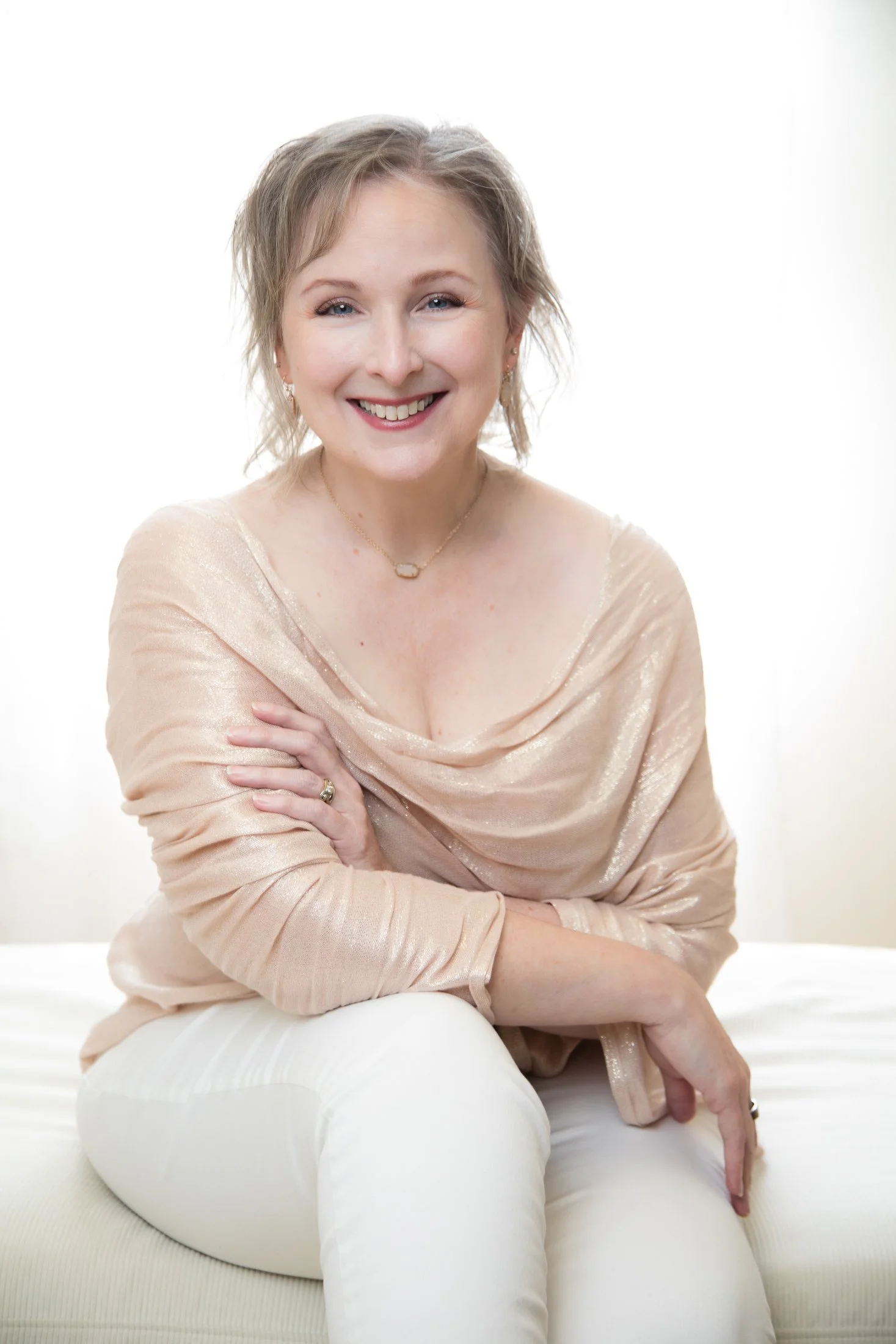 Portrait of Laurie highlighting her expressive eyes and warm smile.