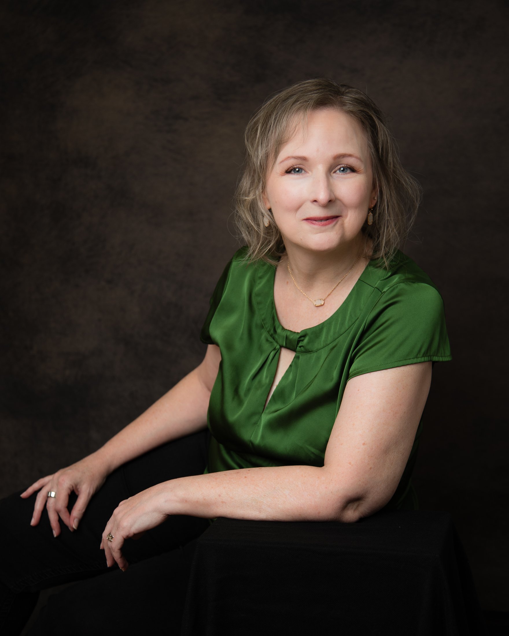 Contemporary portrait of Laurie highlighting her personal style and confidence