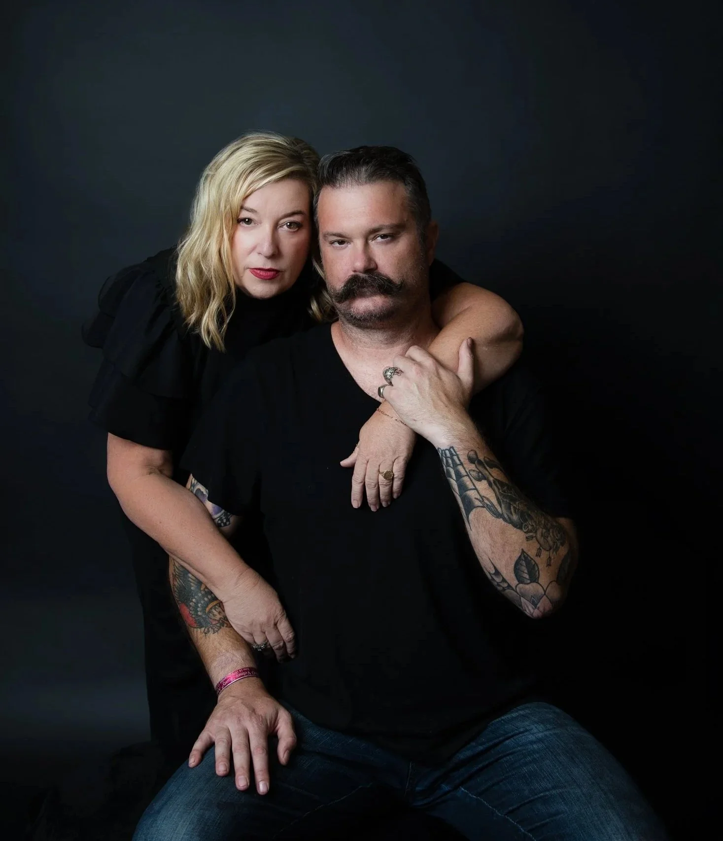 Kimberly and Cody together in a beautiful couple's portrait, highlighting their connection (and his tattoos!)