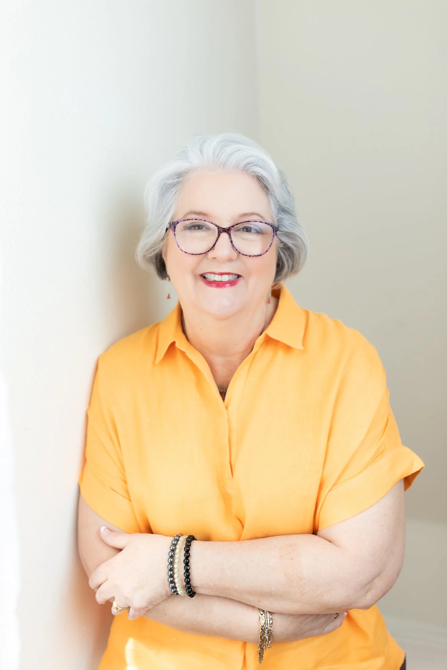 Judith radiates confidence in her 50 Over 50 portrait captured by Houston photographer Amanda Faucett.