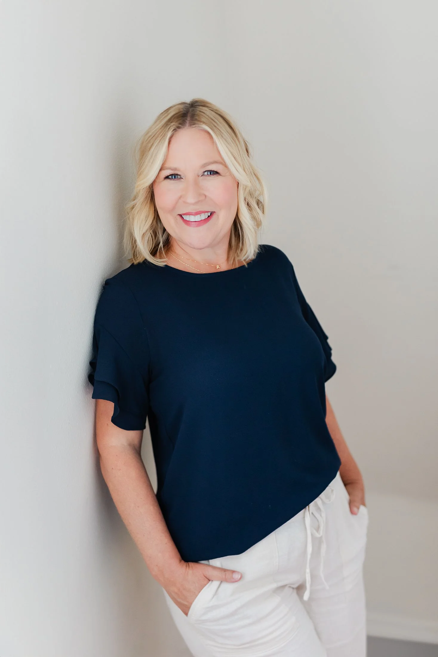 Ann radiates confidence in her 50 Over 50 portrait captured by Houston photographer Amanda Faucett.