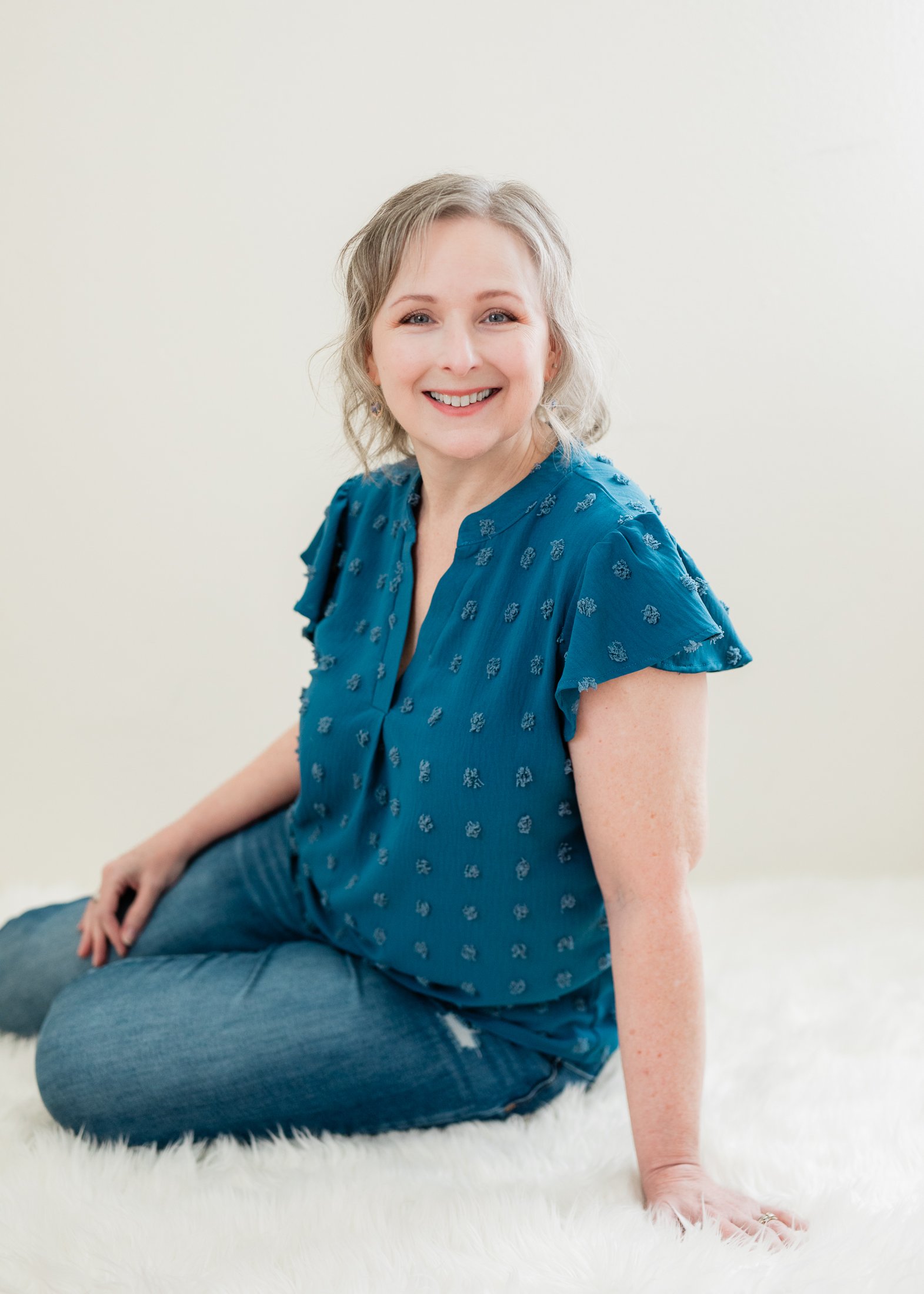 Portrait of Laurie in soft window light during her Houston studio session.
