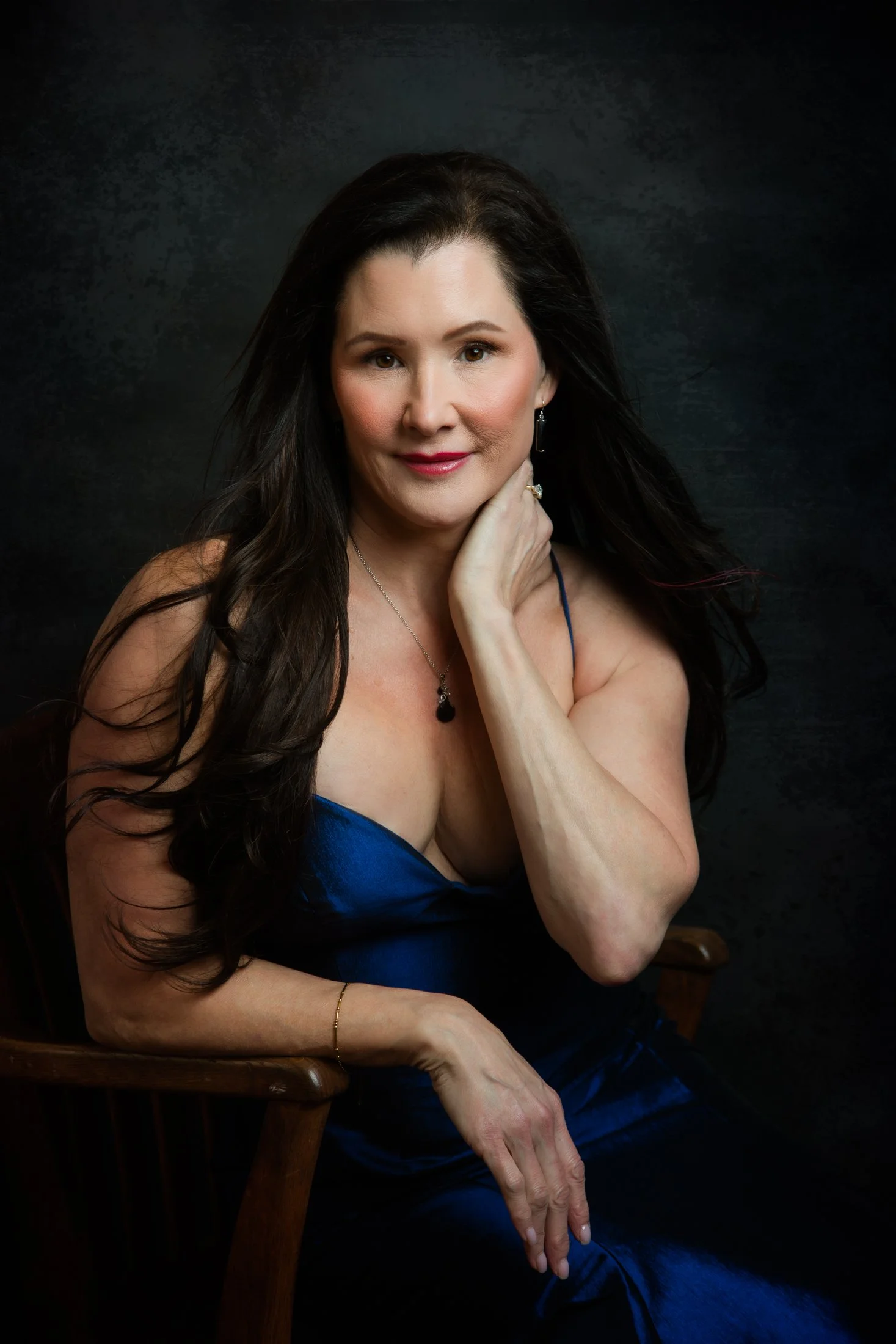 Michelle radiates confidence in her 50 Over 50 portrait captured by Houston photographer Amanda Faucett.