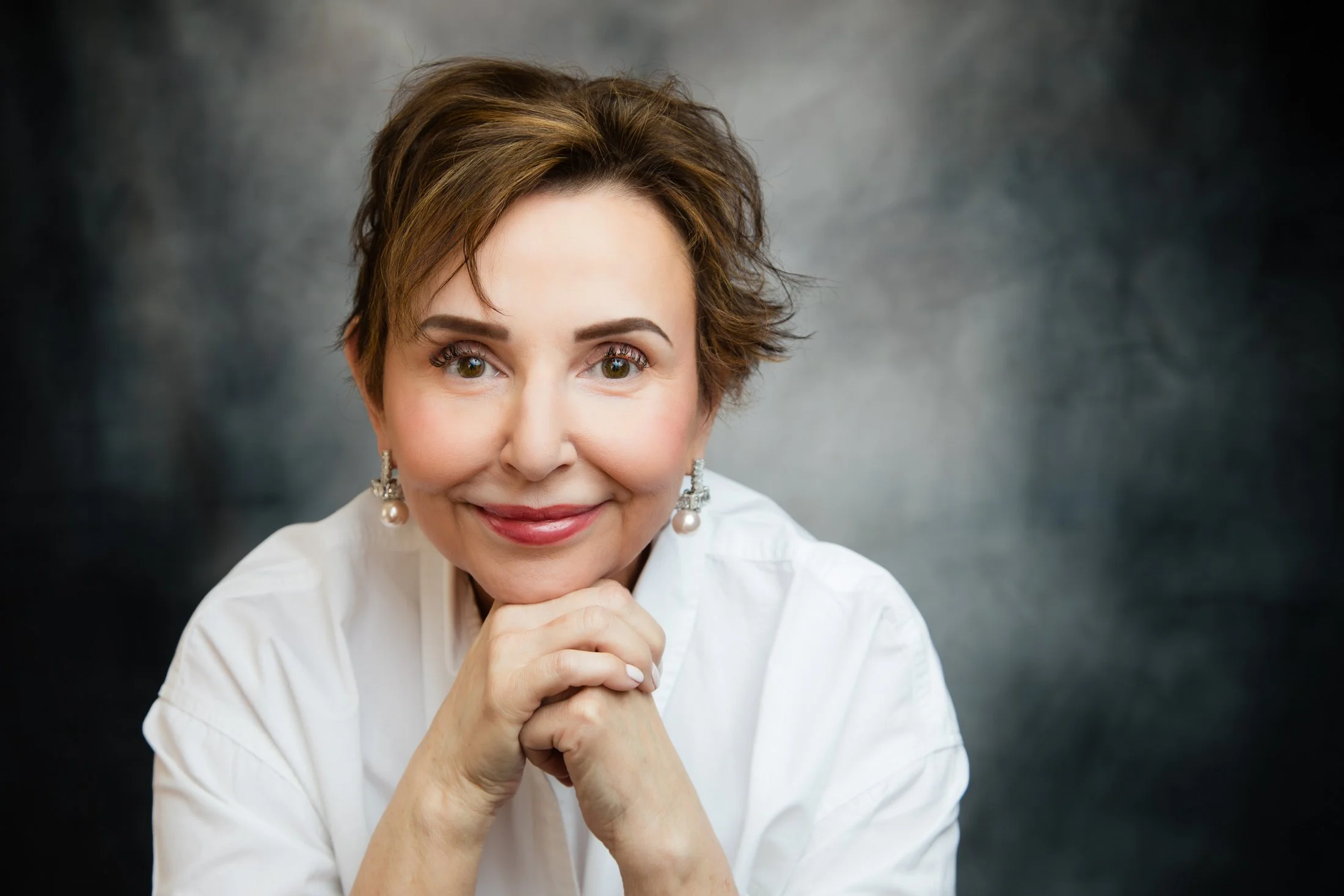 Rosalind radiates confidence in her 50 Over 50 portrait captured by Houston photographer Amanda Faucett.