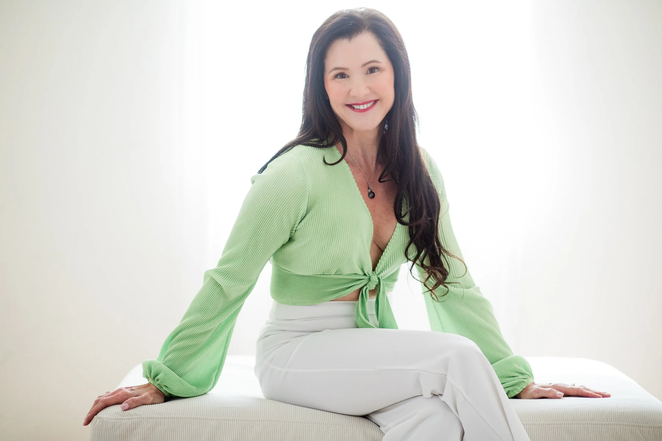 Michelle radiates confidence in her 50 Over 50 portrait captured by Houston photographer Amanda Faucett.