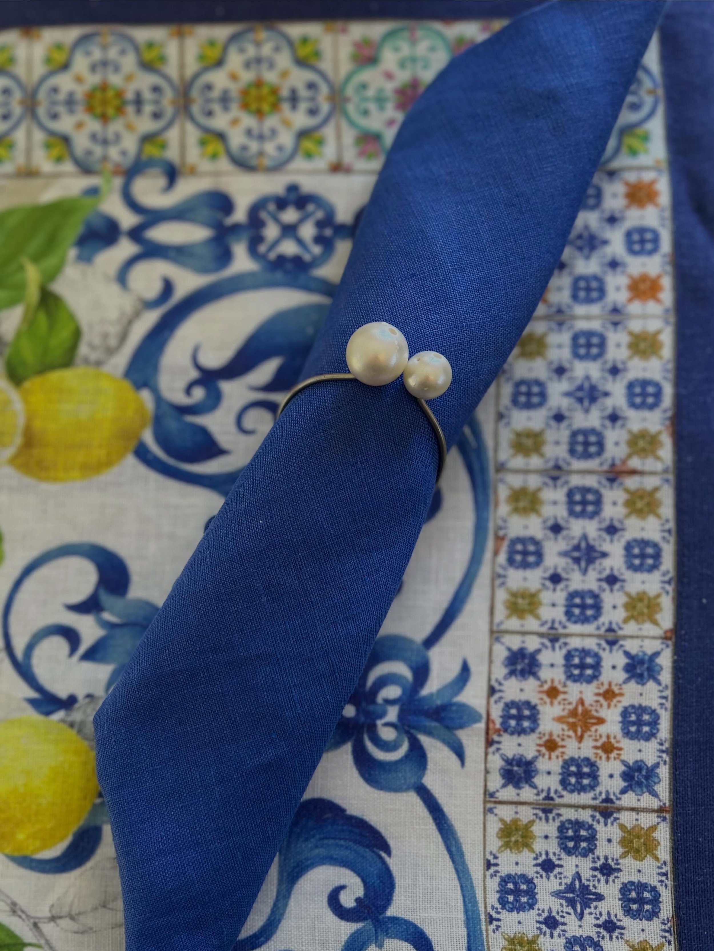 We love the table linens from Tessitura Toscana Telerie, a world-renowned Tuscan linen company. We carry their tablecloths, table runners, napkins  and dish towels. For instance, many are in the same pattern so you can place a tablecloth with the mat