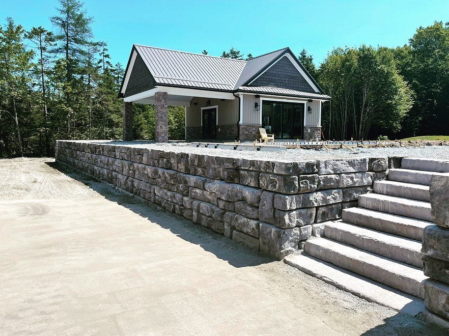 We are please to now be offering landscape retaining wall systems. Check out this awesome wall with stairs we just completed using Duracast Redi-Rock blocks
