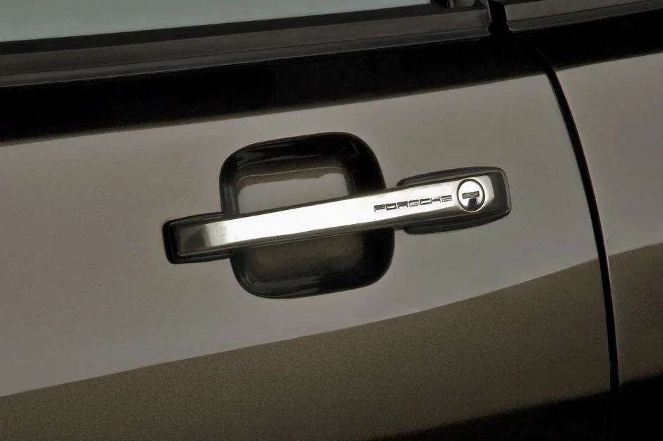 Door handles from a Porsche 944 Turbo that I carefully polished, and my body guy begrudgingly made functional.