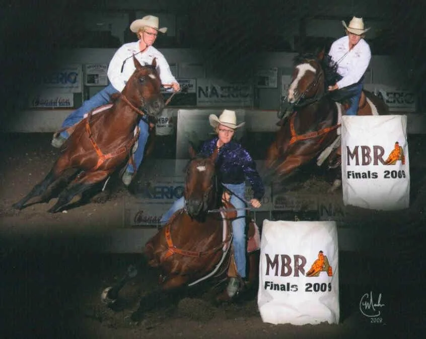 Cathy competing on DAC raised horses at the 2009 MBRA Finals. On the left is our stallion Double Jac Moon.