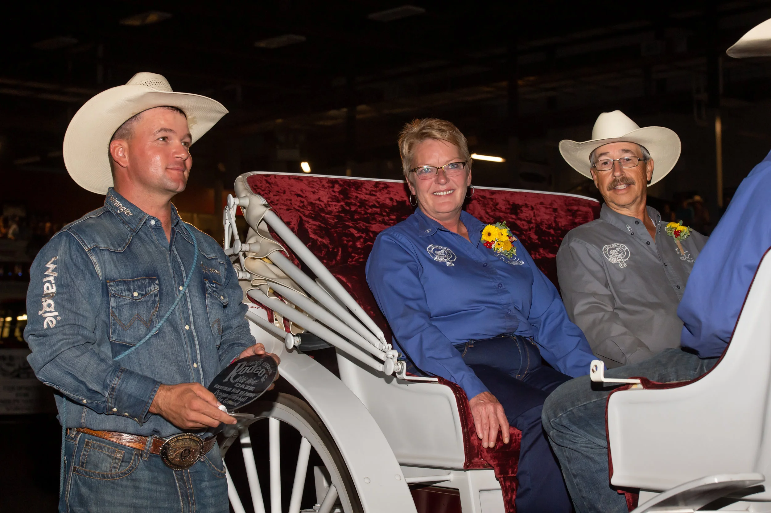 Duncan Campbell and Cathy Gerrand receiving their Virden Indoor Rodeo and Wild West Daze Horseman Hall of Fame award.
