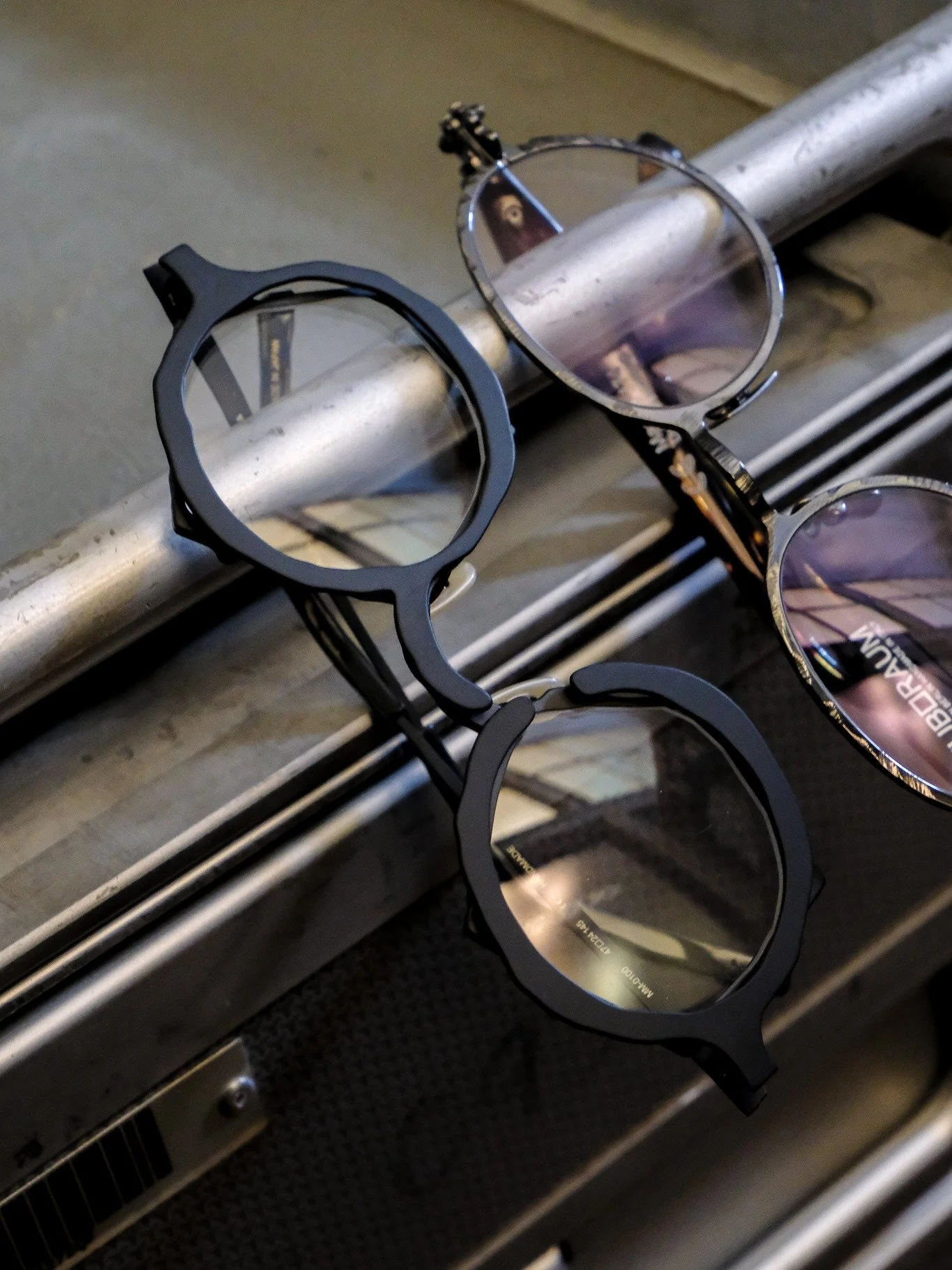 POV: Two designers from opposite sides of the world arrive at the same obsession.

The experimental asymmetry of a Japanese designer alongside German industrial precision.

One soft black. One shiny graphite. Completely different aesthetics, but both