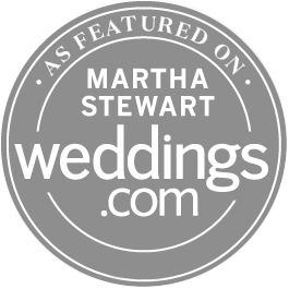 Logo for Martha Stewart Weddings featuring a circular design with the text 'As featured on Martha Stewart Weddings.com'.