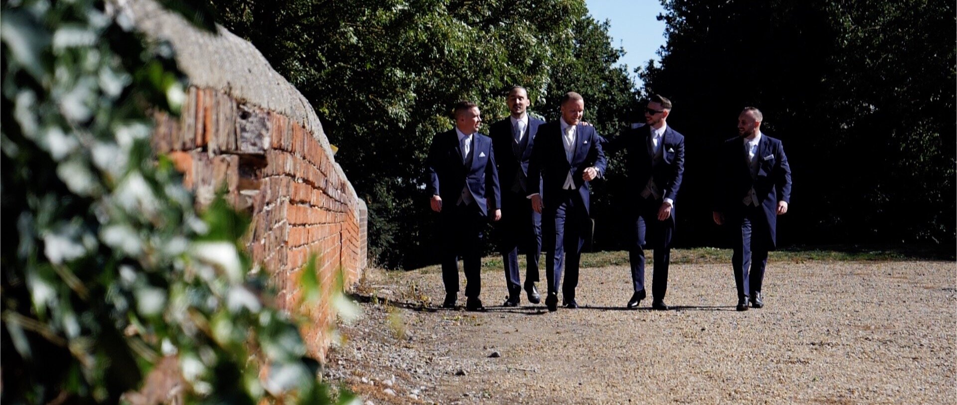 Groom slow motion walk Essex weddings.jpg