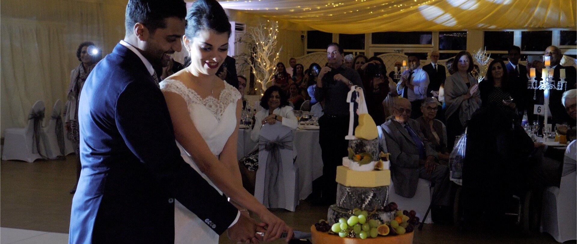 Cutting the cheese cake wedding video.jpg