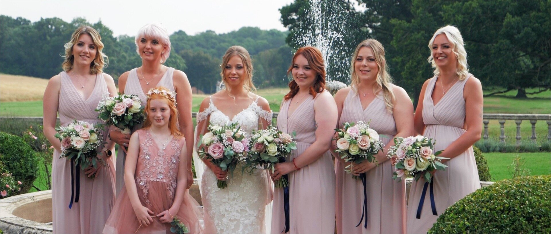 Bride and bridesmaids at quendon hall essex.jpg