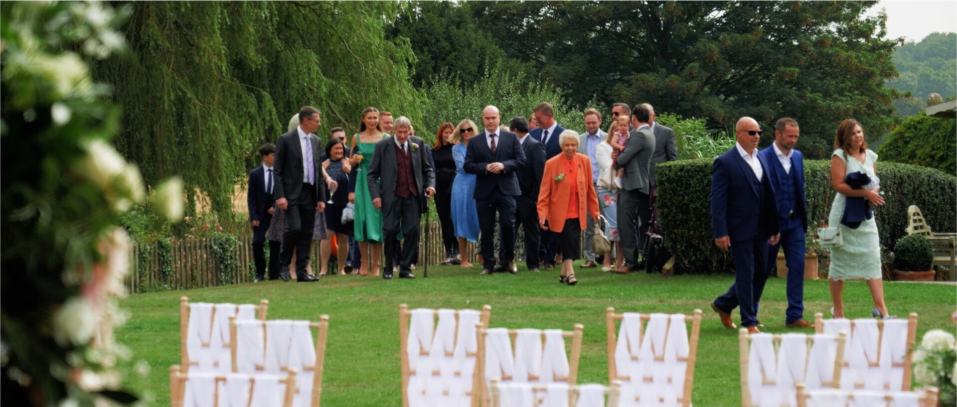Ceremony outside at quendon hall essex videograhpy .jpg