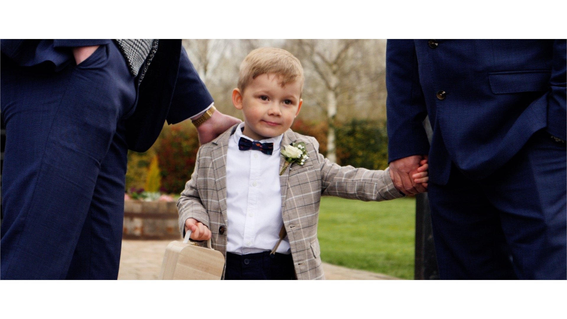 Pageboy at wedding with rings video.jpg