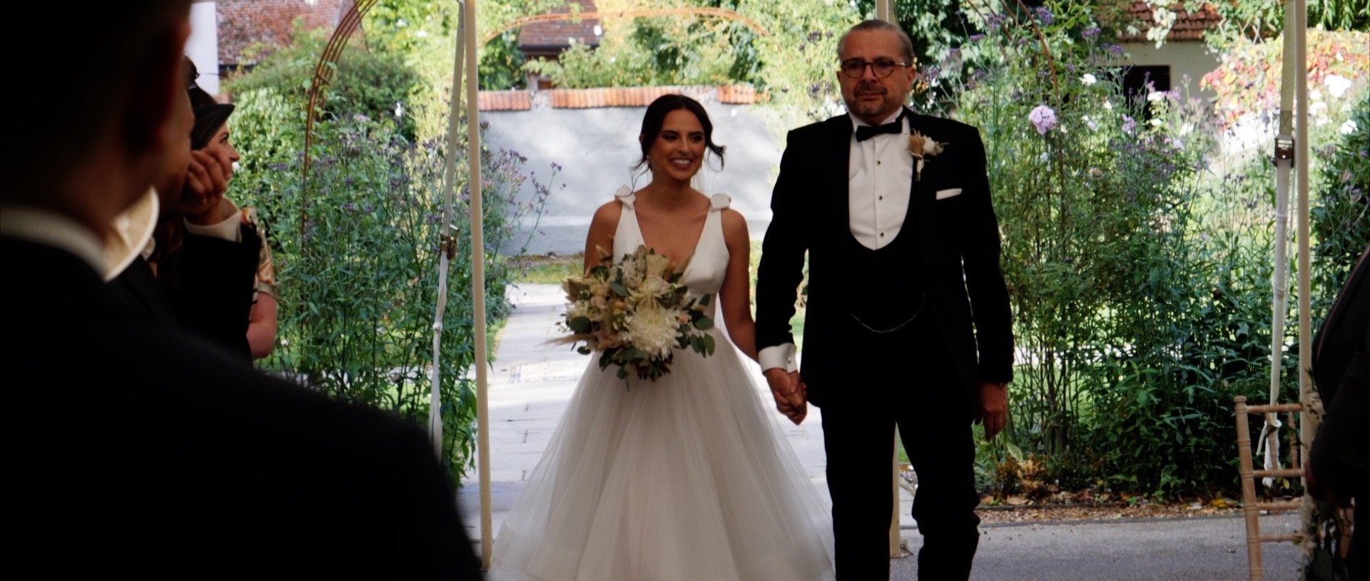 Houchins Wedding Video bride walking down aisle .jpg