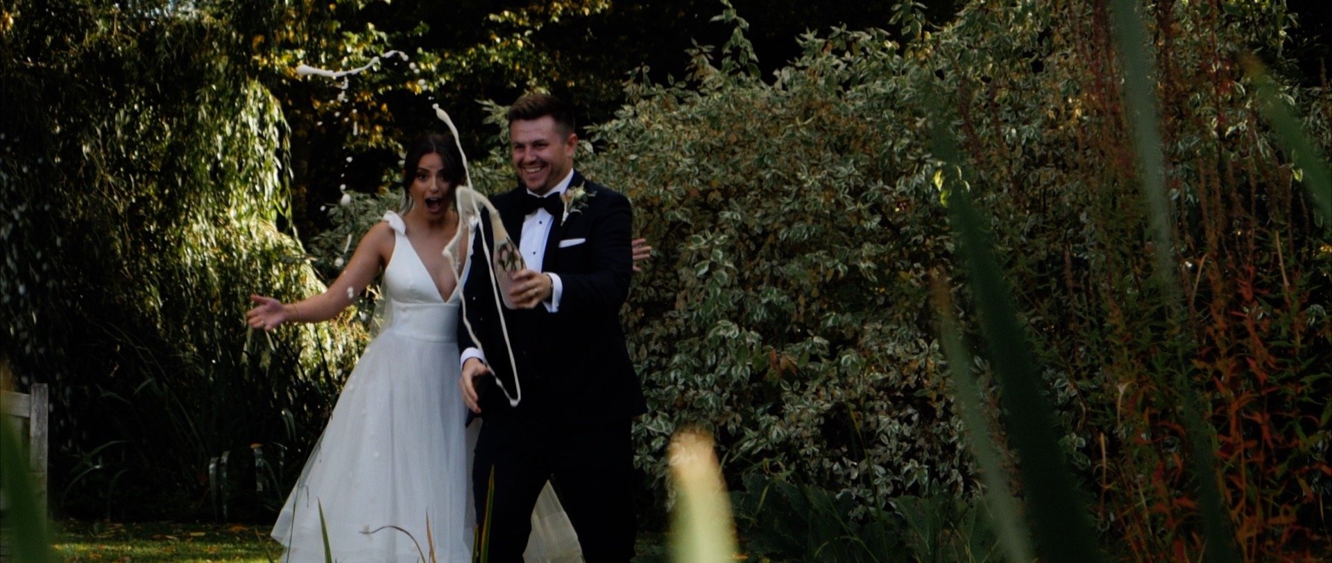 popping champagne bottle wedding video Essex.jpg