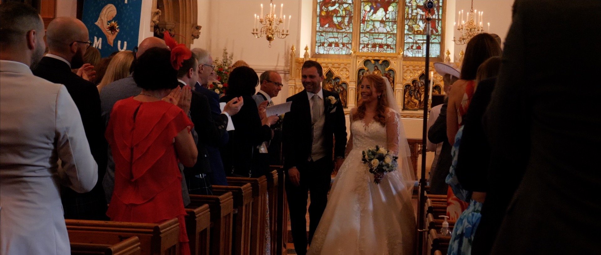 Just married and walking out of church.jpg